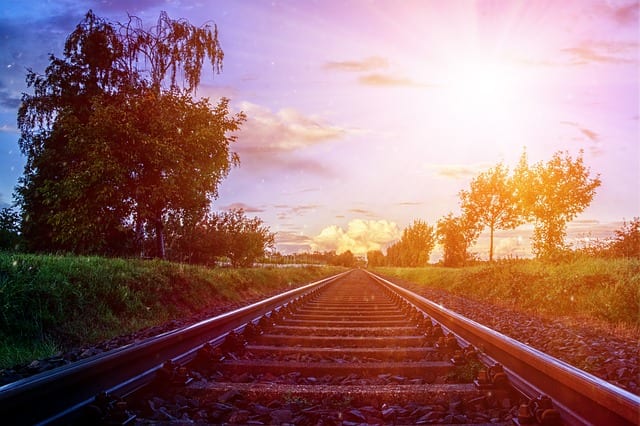 There Are Railroad Tracks that Run Through this Town by Leah Angstman